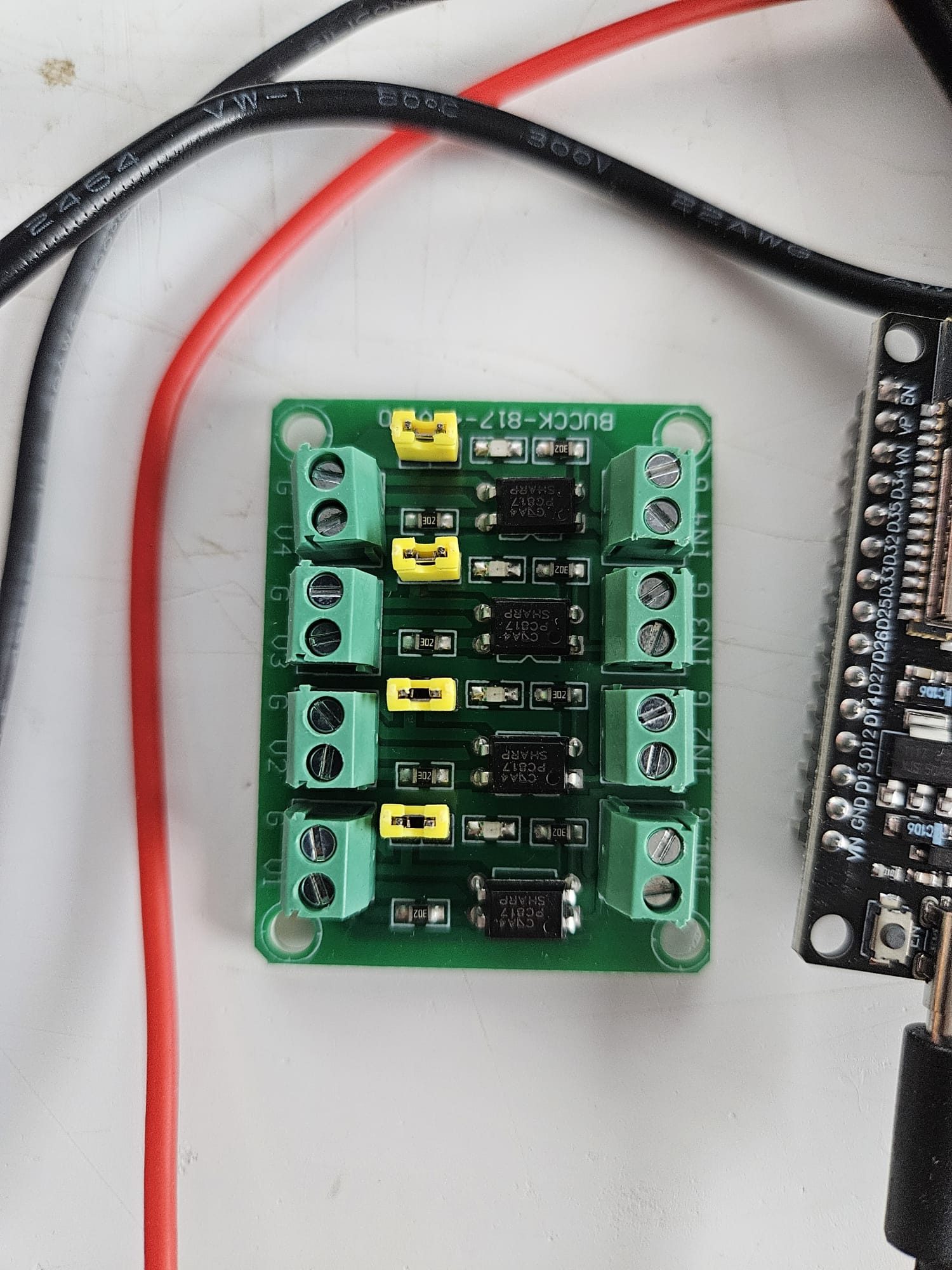 The four-channel PC817 optocoupler board that was tried first and abandoned